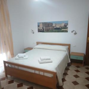 Postel nebo postele na pokoji v ubytování Casa NILLA