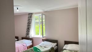 Postel nebo postele na pokoji v ubytování Ciuri's Guesthouse