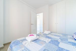 Posteľ alebo postele v izbe v ubytovaní Apart-rent Apartment Av Rhode 3º 2008