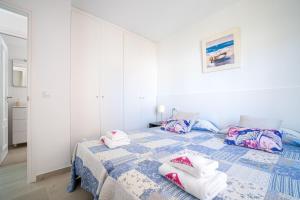 Posteľ alebo postele v izbe v ubytovaní Apart-rent Apartment Av Rhode 3º 2008
