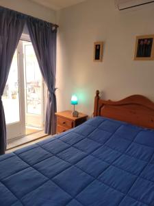 Ein Bett oder Betten in einem Zimmer der Unterkunft Torrox Beach Club