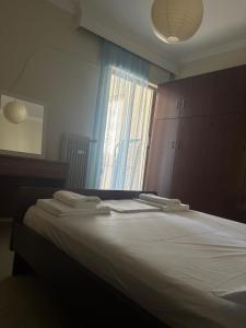 Postel nebo postele na pokoji v ubytování Studio in Ptolemaida