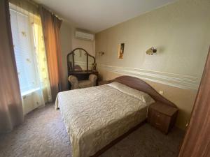 Postel nebo postele na pokoji v ubytování Art Guest House Orchidea