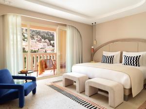 Gulta vai gultas numurā naktsmītnē Monte-Carlo Bay Hotel & Resort