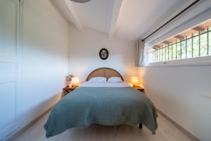 Postel nebo postele na pokoji v ubytování Chez Nelly - Villa avec vue imprenable