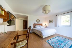 Postel nebo postele na pokoji v ubytování Chez Nelly - Villa avec vue imprenable + 37 fotografií