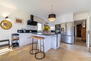 Kuchyň nebo kuchyňský kout v ubytování Chez Nelly - Villa avec vue imprenable