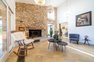 Posezení v ubytování Chez Nelly - Villa avec vue imprenable