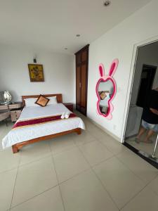 Postel nebo postele na pokoji v ubytování Đức Anh HoTel Vũng Tàu