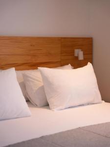Кровать или кровати в номере HOTEL ALOVE