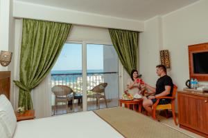 A television and/or entertainment centre at Royal Star Beach Resort