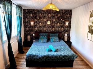 Postel nebo postele na pokoji v ubytování Le 421, Maison d'hôtes Jacuzzi entre amis,familles