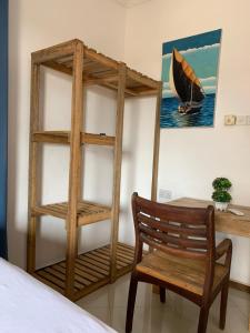 Postel nebo postele na pokoji v ubytování Hello Rafiki GuestHouse - Mkunazini