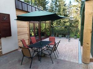 Patio nebo venkovní prostory v ubytování Hétházpuszta Erdészlak