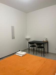 Postel nebo postele na pokoji v ubytování Fiordalisi home
