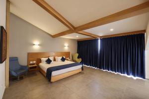 Postel nebo postele na pokoji v ubytování Majestic Byblos Grand Hotel