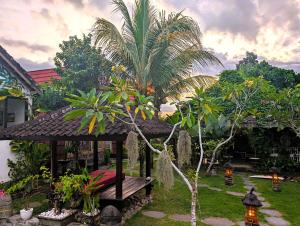 Zahrada ubytování Ayumar Homestay Medewi