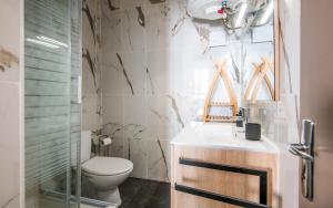 Et badeværelse på Cap jungle 2pers Centre-ville fibre + 15 billeder