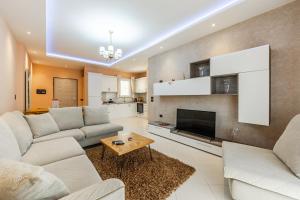 Kuchyň nebo kuchyňský kout v ubytování Easy Stay Residences