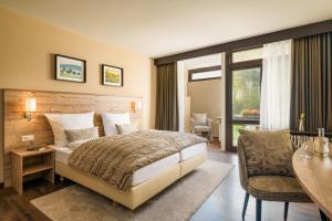 Postel nebo postele na pokoji v ubytování Hotel Luisenpark