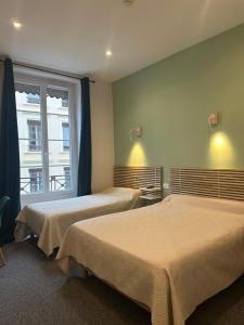 Postel nebo postele na pokoji v ubytování Hotel Azur + 37 fotografií