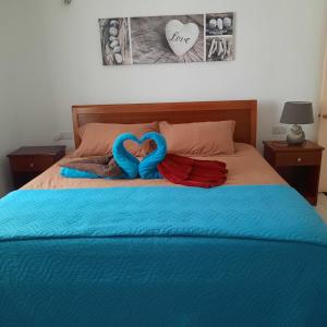 Giường trong phòng chung tại Sunshine Beach Villa