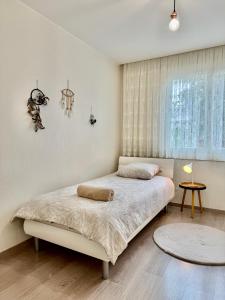 Postel nebo postele na pokoji v ubytování Zenova