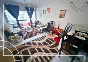 an aerial view of a living room with a couch at Gadou Rooms in Port Said