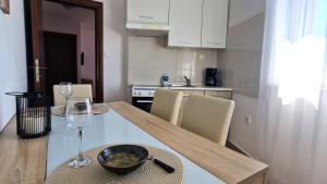 Kuchyňa alebo kuchynka v ubytovaní Apartment Gary