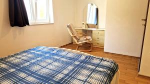 Posteľ alebo postele v izbe v ubytovaní Apartment Gary