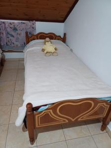 Postel nebo postele na pokoji v ubytování Karaj Apartments