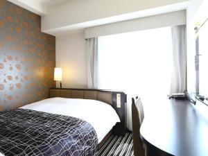 Postel nebo postele na pokoji v ubytování APA Hotel Shimbashi Toranomon + 37 fotografií