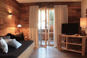 Telewizja i/lub zestaw kina domowego w obiekcie Chalet Tannenhof