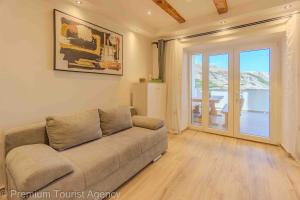 Coin salon dans l'établissement Toncica Sunny terrace with seaview and shaded BBQ area