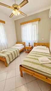 Ένα ή περισσότερα κρεβάτια σε δωμάτιο στο Zinovias House