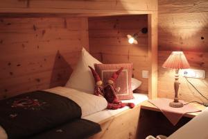 Łóżko lub łóżka w pokoju w obiekcie Chalet Tannenhof
