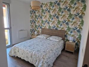 Ένα ή περισσότερα κρεβάτια σε δωμάτιο στο Charmante maison de village