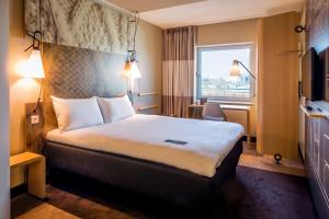 Postel nebo postele na pokoji v ubytování ibis Amsterdam City West