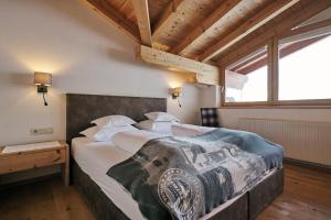 Postel nebo postele na pokoji v ubytování Fürmesli Appartements