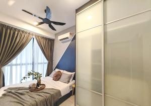 Astetica Residences 200mbps Wifi Netflix客房内的一张或多张床位