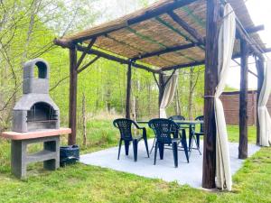 Zahrada ubytování Tatra Glamp Mazury - sieć noclegowa Tatra Glamp