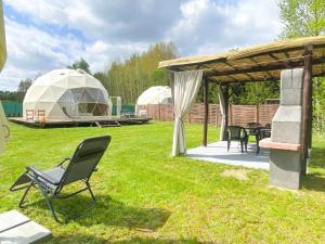 Zahrada ubytování Tatra Glamp Mazury - sieć noclegowa Tatra Glamp