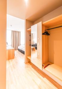 Letto o letti in una camera di Göttfried - essen trinken schlafen