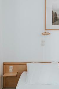 Postel nebo postele na pokoji v ubytování Bofor Studios & Rooms + 11 fotografií