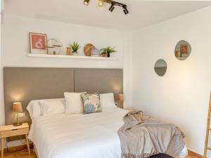 Ένα ή περισσότερα κρεβάτια σε δωμάτιο στο Oasis exclusivo con Piscina privada - Villa Casa Mareluz