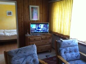 TV a/nebo společenská místnost v ubytování Casa Collina
