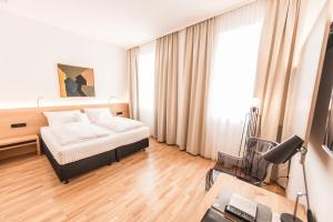 Letto o letti in una camera di Göttfried - essen trinken schlafen