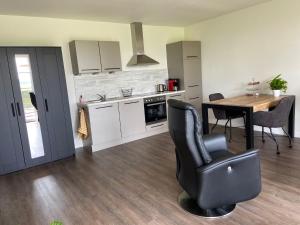 Kuchyň nebo kuchyňský kout v ubytování Hof van Lenthe appartement De Mars