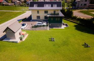 an aerial view of a house with a yard at Vila Savica Bled in Bled