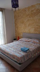Postel nebo postele na pokoji v ubytování B&B 7 Laghi